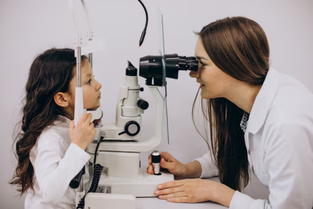 optometrist examining a child’s eyes for signs of myopia progression